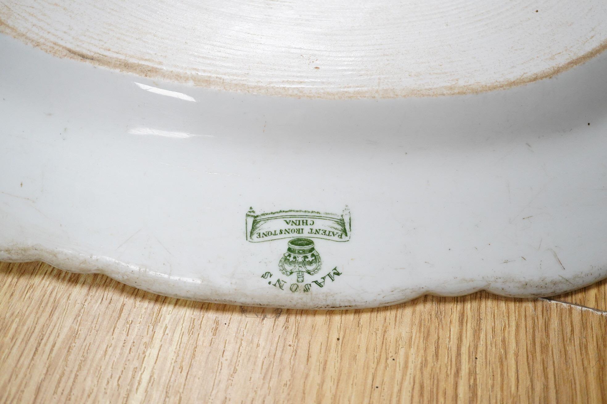 A Mason’s ironstone Cambridge colleges green printed part dinner service, c.1830-40 (11)., Oval plater 43cm wide.